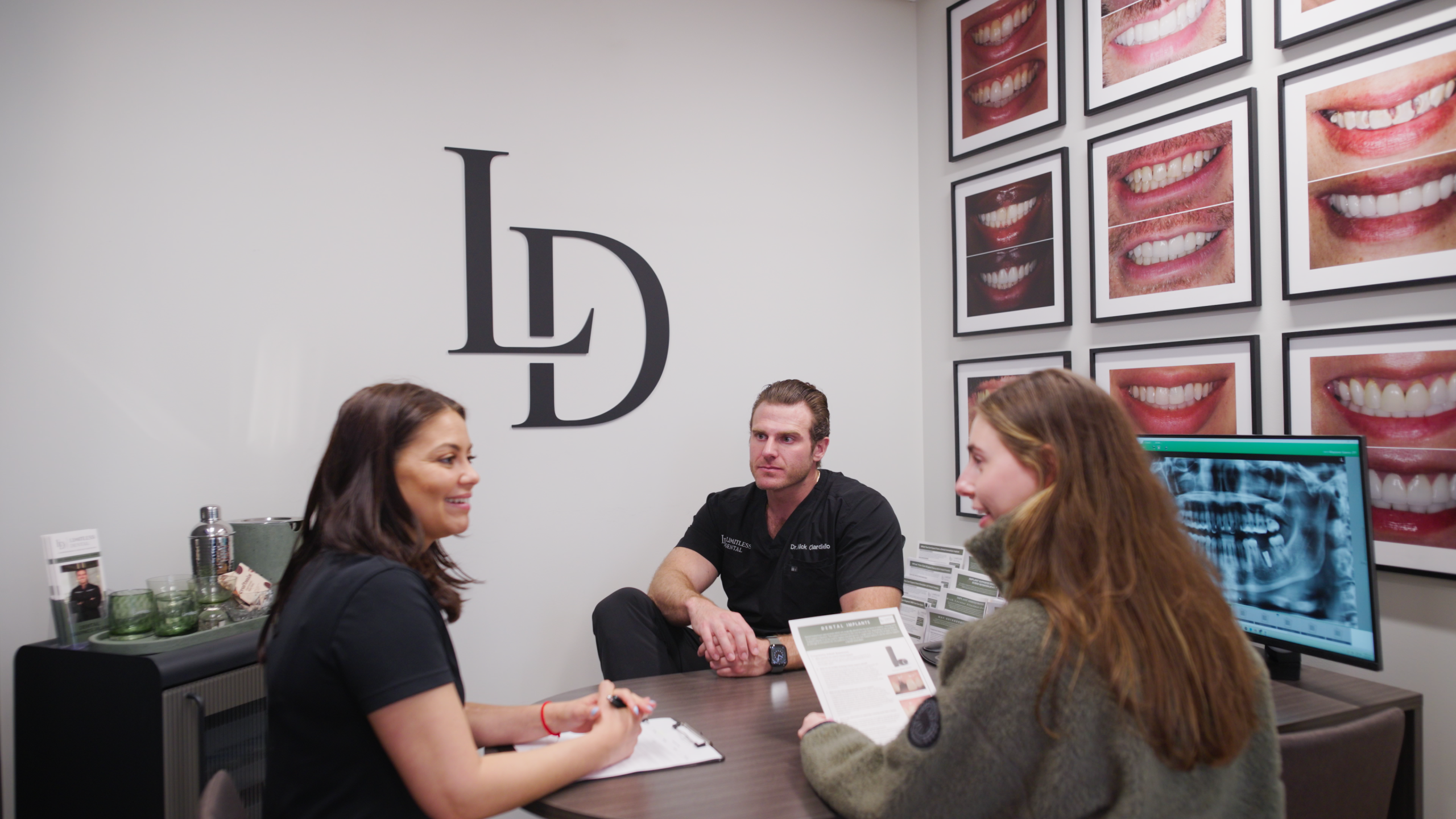 Dr. Nick Ciardiello of Limitless Dental® in Jersey City consulting with a patient and explaining post-extraction care to prevent dry socket.