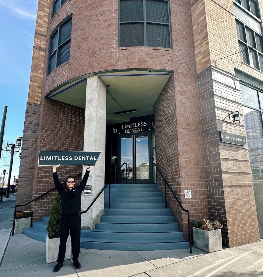 The Limitless Dental entrance and street sign at 314 Coles Street in Jersey City