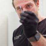 Dr. Nick Ciardiello at Limitless Dental in Jersey City demonstrating dental needle for numbing during an emergency dental procedure